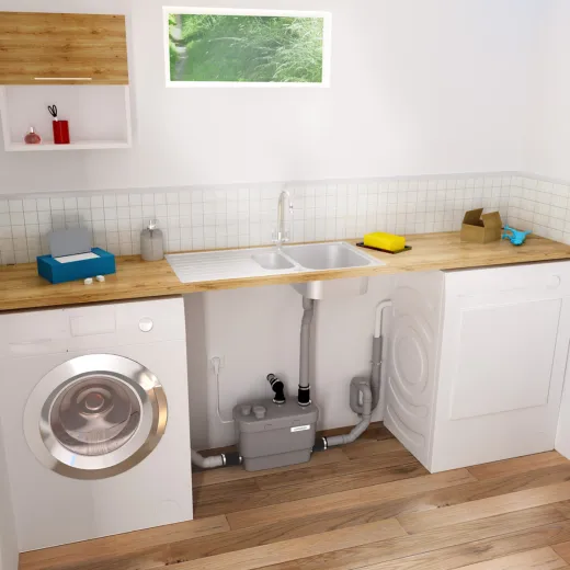 Pompe SFA pour cuisine et buanderie derrière un lave-linge